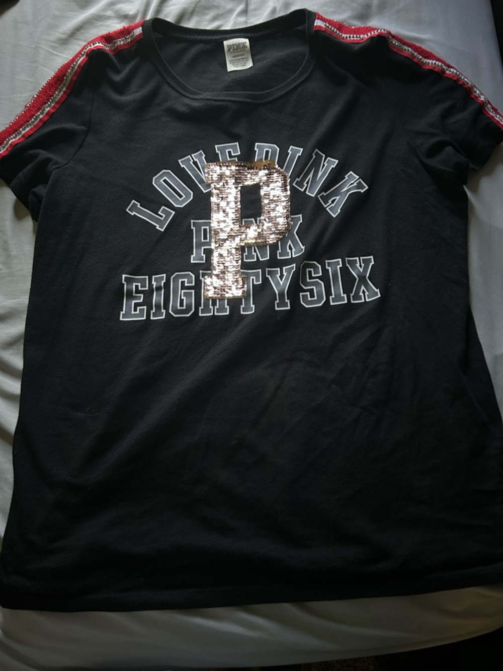 PINK Victoria's Secret Black Tee with Pink Sequin 'P' and Red Shoulder Stripes